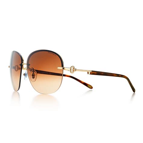 Tiffany Keys aviator sunglasses with gold.